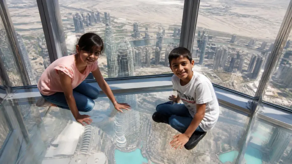 Kids on the glass floor at Burj Khalifa Kids on the glass floor at Burj Khalifa